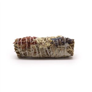 Smudge stick made with white sage, lavender, and mullein for cleansing rituals.
