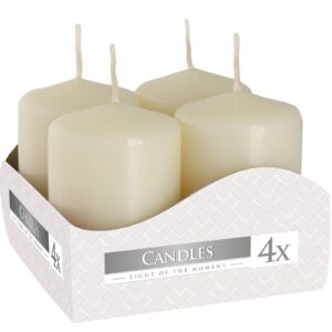 Set of four ivory pillar candles, perfect for creating a calming atmosphere.
