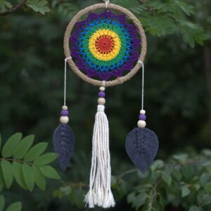 Handmade medium rainbow dream catcher from Bali with rattan and wooden beads.