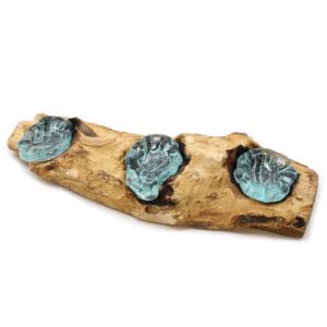 Elegant flat triple candle holder made from molten glass and wood.