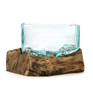 Medium bowl made of molten glass on a wooden stand, perfect for home decor.
