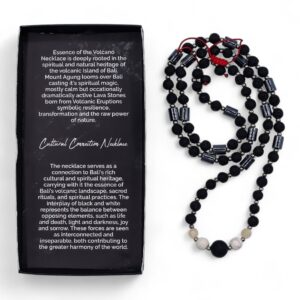 Necklace featuring black lava and white howlite stones symbolising balance.