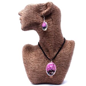 Bright pink pressed flowers in a glass pendant necklace and earrings set.