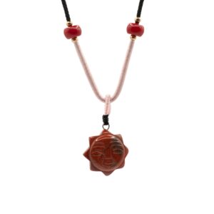 Carnelian Sun Face pendant on adjustable cord, showcasing natural gemstone beauty.