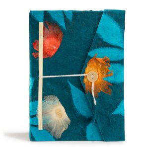 Large midnight blue notebook with bold floral design and bookmark included.