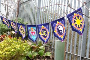 7 Flags Banner featuring vibrant colours and intricate batik design.