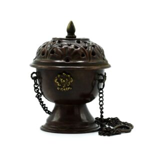 Elegant copper Tibetan incense burner with a verdigris finish, hanging design.