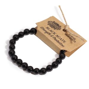 Elegant black agate power bracelet with a stretchy design for comfortable wear.