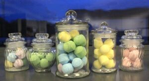 Stylish vertical ribbed candy jar perfect for home decor and storage.