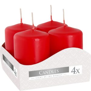 Set of four red pillar candles, perfect for creating a warm ambiance.