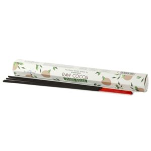 Raw cocoa incense sticks in a natural setting, perfect for mindful living.