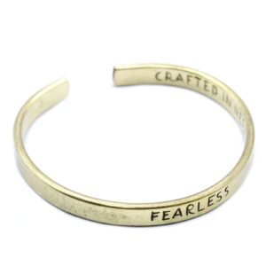 Handcrafted brass bracelet with inspirational messages, perfect for gifting.