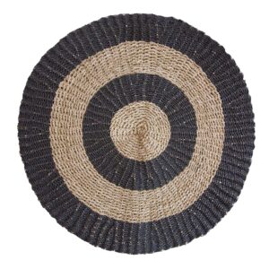 Stylish round seagrass basket in black and tan, perfect for home decor.