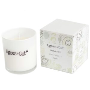 A beautifully crafted votive candle with a soft floral scent, perfect for relaxation.