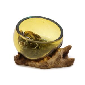 Handcrafted molten glass mini amber bowl on a wooden base.
