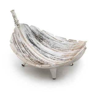 Hand-carved whitewash coconut leaf bowl with natural textures and rustic charm.