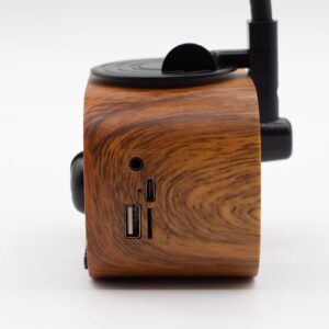 Retro mini gramophone speaker with a classic horn and wood-effect base.