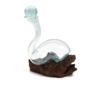 Handmade molten glass decanter on a wooden base, showcasing natural elegance.