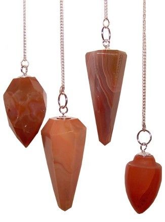 Carnelian gemstone pendulum with silver chain and bead for dowsing