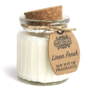Reusable glass jar soy candle with cork lid and natural label.