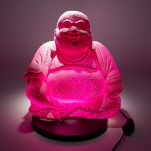Round stand Laughing Buddha lamp with a vibrant pink crackle finish.