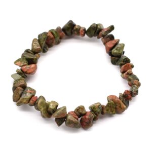 Stylish green jasper chipstone bracelet on a neutral background.