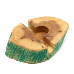 Stylish greenwash wooden phone holder on a desk with a mobile device.