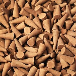 Bulk incense cones in vibrant orange and cinnamon fragrance, perfect for gifting.