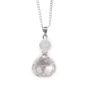 Rock quartz gemstone pendant with intricate healing hands design.