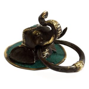 Brass door knocker featuring an elephant's head design for home decor.
