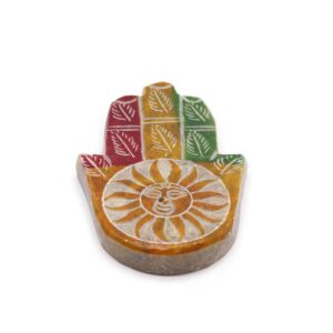 Soapstone Hamsa incense holder featuring a sun face design.