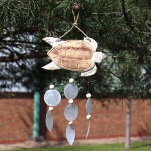 Elegant whitewash turtle carving with natural copis drop for home decor.