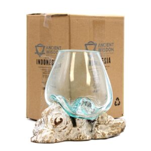 Large molten glass bowl on whitewash wood, perfect for home decor.