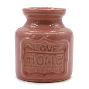 Ceramic home oil burner in vibrant colours, perfect for aromatherapy.