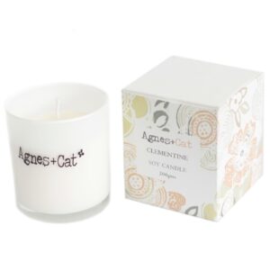 Clementine votive candle by Agnes + Cat, showcasing its vibrant orange hue.