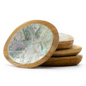 Handcrafted teak mini bowls with intricate shell details, showcasing natural beauty.