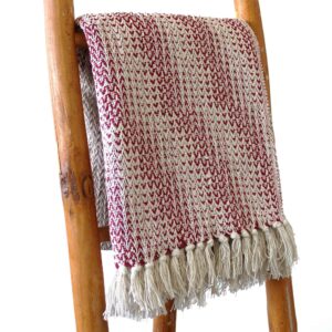 Ruby two-tone cotton throw with cream tassel fringe, perfect for home decor.