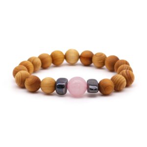 Cedarwood Heart Chakra Bangle featuring a beautiful Rose Quartz gemstone.