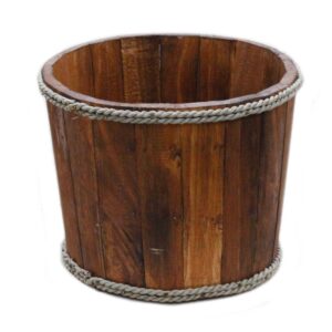 Small wooden storage tub in warm brown, ideal for home organisation.
