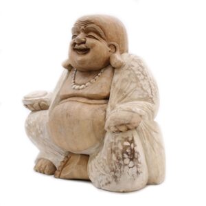 Hand-carved whitewash Buddha statue showcasing intricate details.