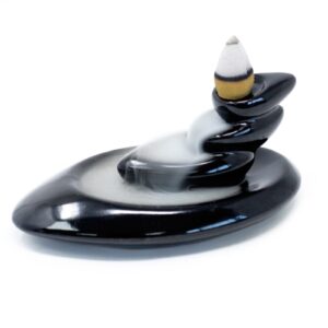 Small pebbles backflow incense burner with cascading smoke effect.