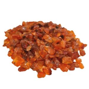 Bulk carnelian gemstone chips in a natural, earthy tone for crafting and decor.