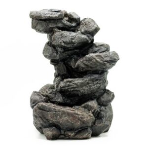 Natural rocks formation tabletop water feature with cascading waterfall.