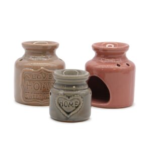 Ceramic oil burner in vibrant colours, perfect for home fragrance and decoration.
