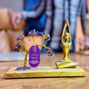 Handcrafted Amethyst Yoga Garden featuring a tilted tree in Sukhasana pose.