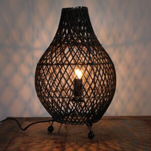 Dark brown rattan table lamp showcasing intricate patterns and textures.