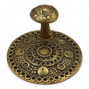 Brass-effect mushroom incense holder with detailed embossed design.