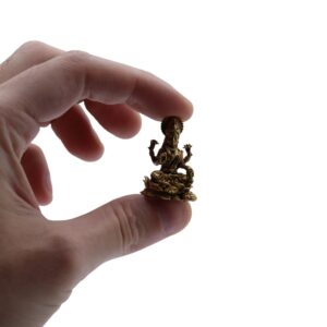 Finely detailed brass figurine of Goddess Laxmi, symbolising prosperity.