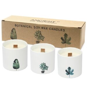 Large Botanical Candle in round ceramic jar with wooden wick and floral design.