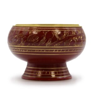 Handmade burgundy charcoal incense jar with golden patterns for rituals.